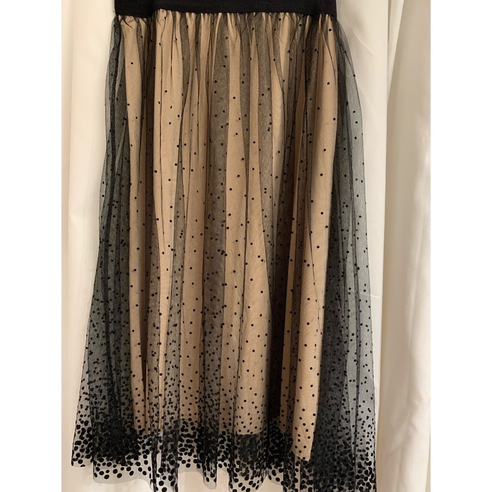 Nude and black skirt